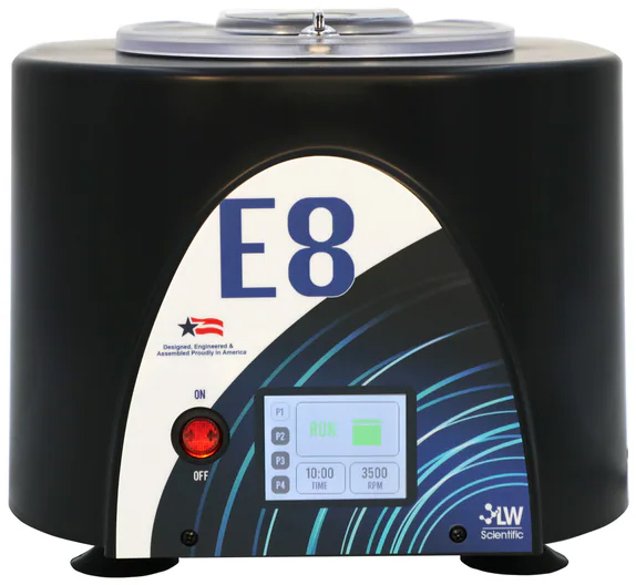 The TrueBond animal health centrifuge shows its digital display and status tracker lid lighting illuminated